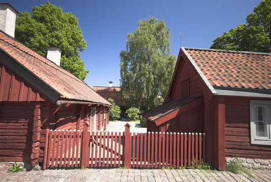 red swedish wooden houses
