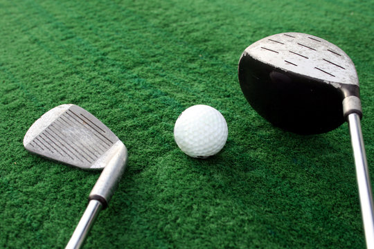 golf clubs and golf ball