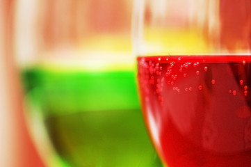 red and green cocktails with shallow depth of field