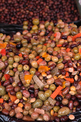 olives and pickled vegetables at the market