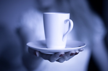 stretching cup of coffee