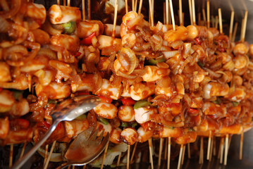 cooked BBQ meats in the pan