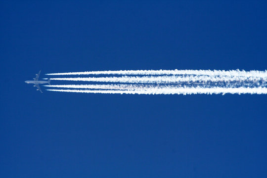  Airplane four engines aviation airport contrail clouds travel trip concept