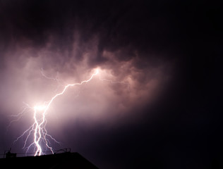 lightning flashes the darkness