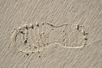 Fototapeta na wymiar Ślad w piasku