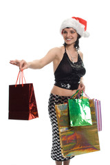 beauty girl in red cap with gifts over white background