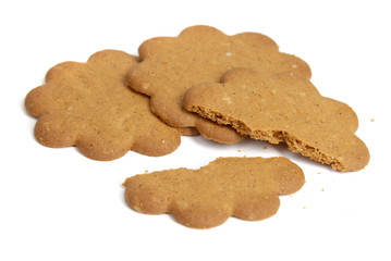 three cookies and one broken cookie over white