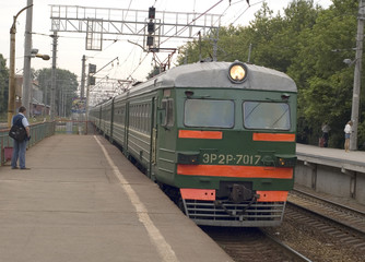 Naklejka na ściany i meble arrival electric train on platform