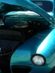 Blue 1941 antique roadster with open hood