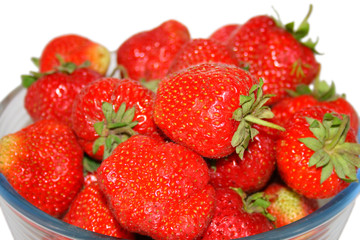 Vase with the ripe fresh berries.