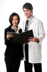 A young male doctor with female colleague on white background