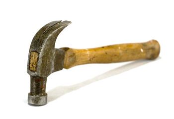 well used hammer on white background