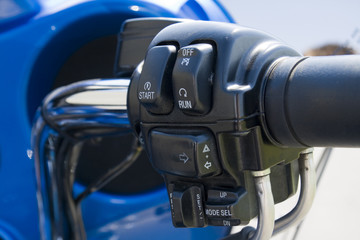 Close-up view of motorcycle handlebar controls