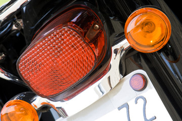 Close-up view of motorcycle rear lights
