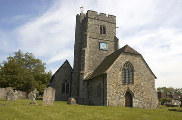 Fototapeta na wymiar A rural church with blue sky in Kent,England