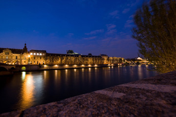 View across the Seine River at night, Paris, France