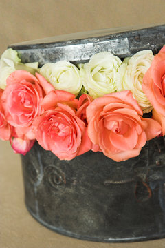 Arrangement of roses in a hat box