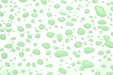 Surface covered with the green  water drops