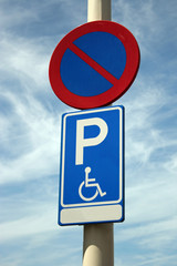Handicap parking sign on a lantern pole