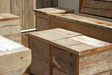 Wooden chairs and tables at a restaurant terrace