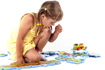 Young girl and puzzles