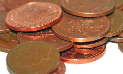 Copper coins on white background