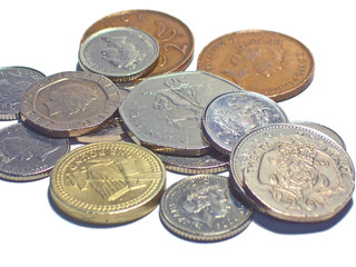 Loose change on white background
