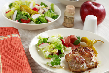 Steaks with mixed salad