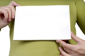 woman hands holding an empty card in the chest