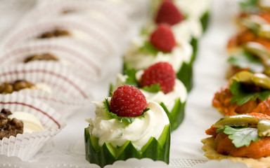 Plate with small snacks served at a party
