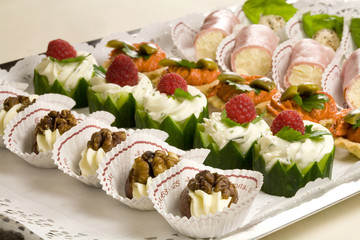 Small snacks on a plate ready to be served at the party