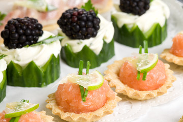 Plate full of delicious party snacks 