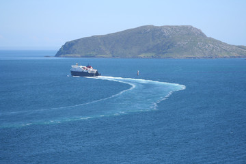 Passenger ferry turning to reach open ocean