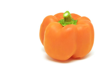 Orange bell pepper on white background