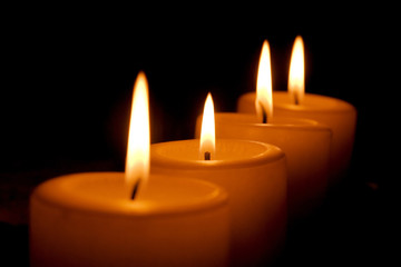 Four burning candles