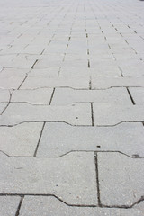 Sidewalk paved by a stone