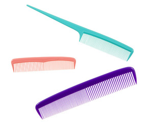 Green, pink and violet combs; isolated, paths included