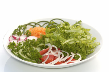 cut vegetable on white plate