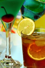 Summer alcoholic recreational drink with cherry and lemon