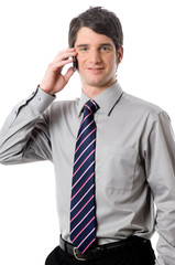 Young Businessman in Shirt and Tie on Phone