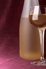 white wine in glass and bottle
