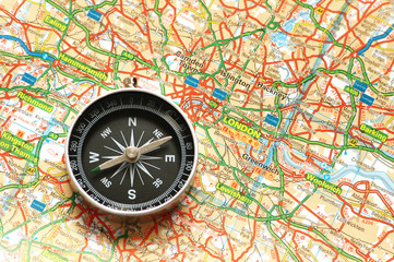 Compass over the map of UK  - London suburbs
