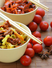Chinese noodle, cherry tomatoes and anise close-up
