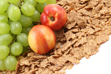 healthy snack - pile of cereals and fruits isolated on white