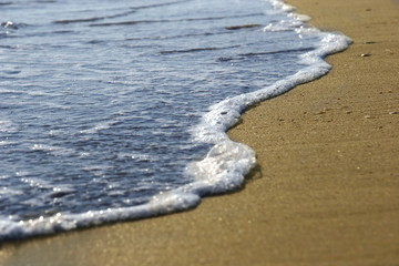 water edge on sand beach