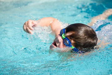 Swimmer takes a breath of air
