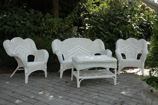 White Wicker Furniture On Brick