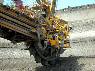 Great mining wheel of coal digger is in action