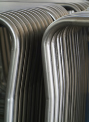 Rack of steel tubes for furniture production.