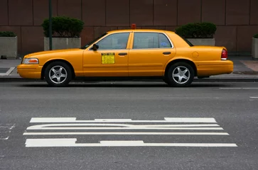Foto op Plexiglas New York taxi Geparkeerde gele taxi, zijaanzicht, Manhattan, New York